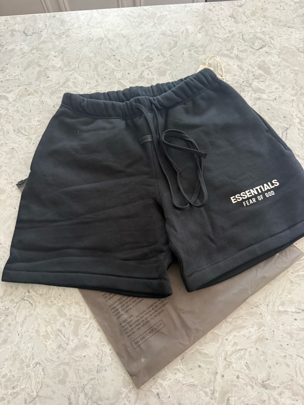 Fear of God ESSENTIALS Black Logo Sweat Shorts